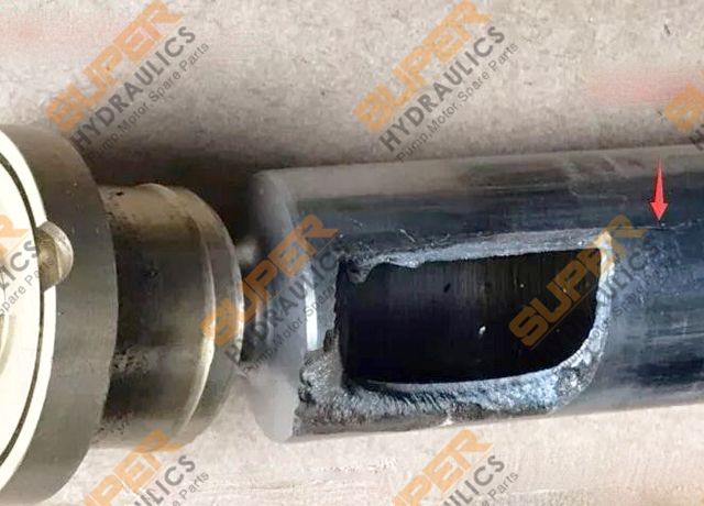 BUSTED PISTON DUE TO HIGH PRESSURE